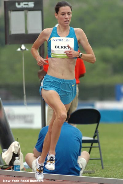 Catherine Berry, pictured here with two laps to go, finished fourth in 16:09.48.