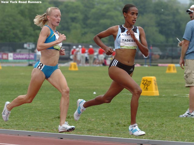 Mestawot Tadesse of Ethiopia and Shalane Flanagan of the U.S. run in third and fourth place.