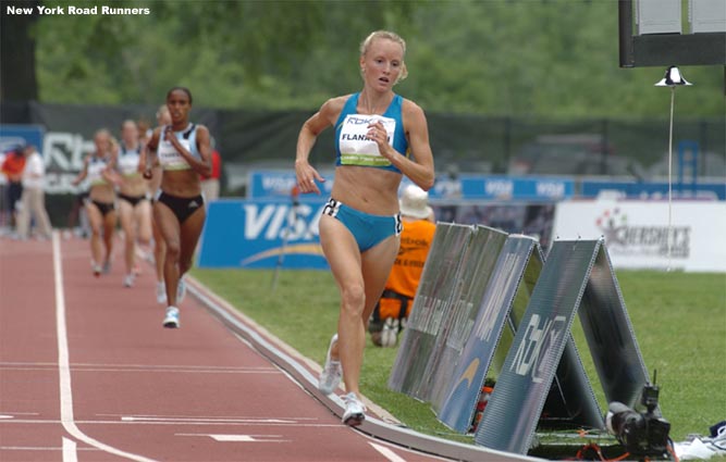 With two laps to go, Shalane Flanagan looked great and had put even more distance on Mestawot Tadesse.