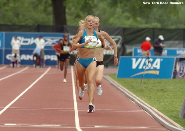 Shalane Flanagan looked like she would place third as she headed up the homestretch, but as she faded on the final lap, her former NCAA rival Kim Smith put in a strong charge...