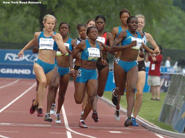 Kenia Sinclair (right) of Jamaica led through 400 meters.