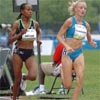 Shalane Flanagan (at right) ran an aggressive race from the start, she ran right behind the rabbit through the first two laps, ahead of Meseret Defar and Werknesh Kidane.