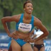 Kameisha has a smile on her face as she watches the replay, possibly because she snuck under the World Championships qualifying time of 2:00.00 by .01 of a second.