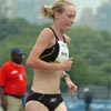 Kim Smith of New Zealand, who finished out her collegiate career at Providence College in November, runs in sixth place.