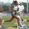 Sentayehu Ejigu runs behind Ejegayehu Dibaba.