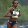 With one lap to go, Tirunesh Dibaba would have had to run something in the order of 56 seconds to break the world record.