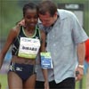 Tirunesh Dibaba is congratulated by Mark Wetmore, who serves as her agent and was also the meet director.