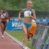 With two laps to go, Shalane Flanagan looked great and had put even more distance on Mestawot Tadesse.