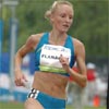 Shalane Flanagan continued to run in third place with one lap to go, and looked like she was headed to a great time.