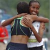 Meseret Defar (left) give Werknesh Kidane a hug.