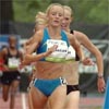 Shalane Flanagan looked like she would place third as she headed up the homestretch, but as she faded on the final lap, her former NCAA rival Kim Smith put in a strong charge...