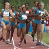 Kenia Sinclair (right) of Jamaica led through 400 meters.