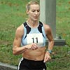 Carrie Tollefson - who usually runs a maximum of 5,000 meters on the track - runs in sixth place.