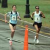 Sylvia Mosqueda (right) and Emilie Mondor run 7-8 in the fourth mile.