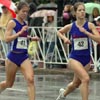 Twins Tara (leading) and Kara Storage of Beavercreek, Ohio, ran together the entire way and finished 22nd and 23rd, respectively, both in 35:04.