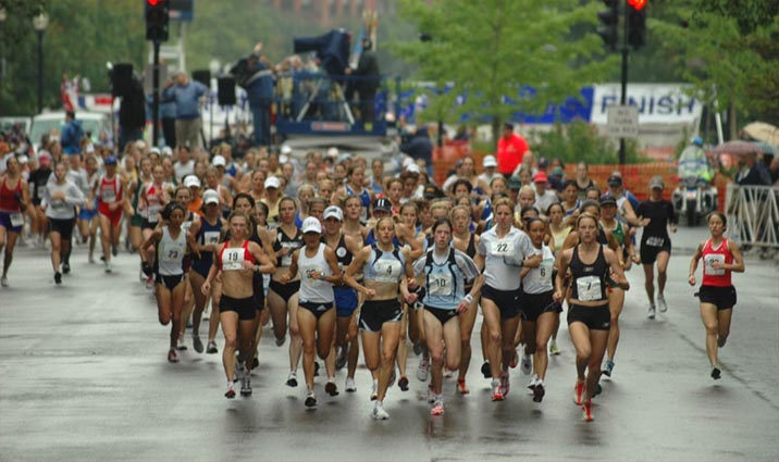 The runners head up Charles Street shortly after the start.