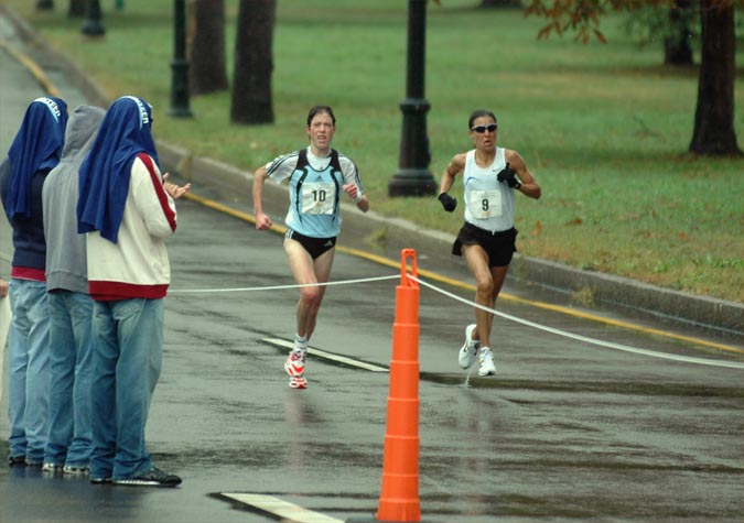 Sylvia Mosqueda (right) and Emilie Mondor run 7-8 in the fourth mile.