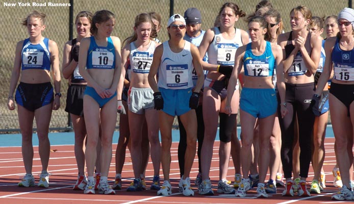 The runners wait for the start of the race.