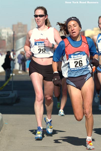 Christina Blackmer runs behind Carmen Troncoso.