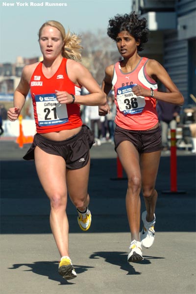 Ann Gaffigan runs with Veena Reddy.