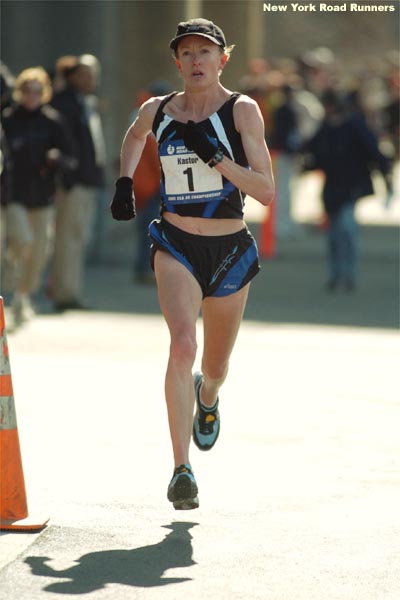 Heading back into the stadium, she had about 500 meters more to run on the track. It was apparent...