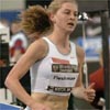 Lauren Fleshman continues to run in third place.