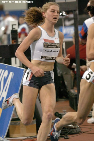 Lauren Fleshman continues to run in third place.