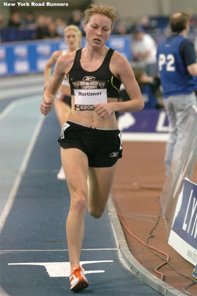 Amy Mortimer runs in fourth place.