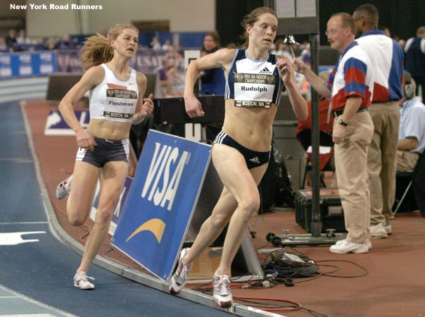 Amy Rudolph leads Lauren Fleshman with one lap to go.