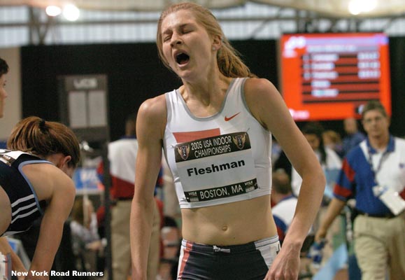 Fleshman shows her pain as she crosses the finish line.