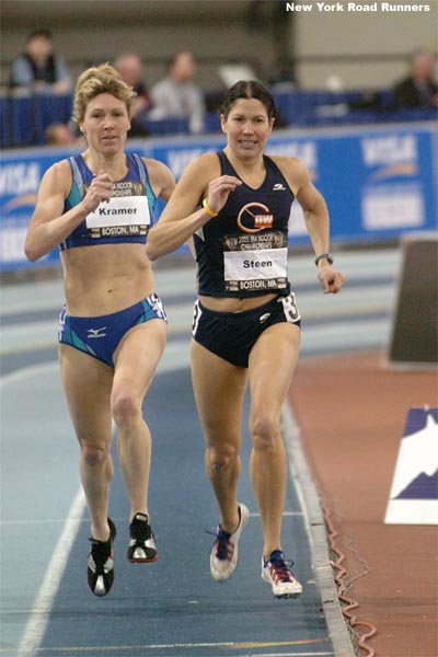 With one lap to go, Karen Steen and Sarah Kramer battle it out...