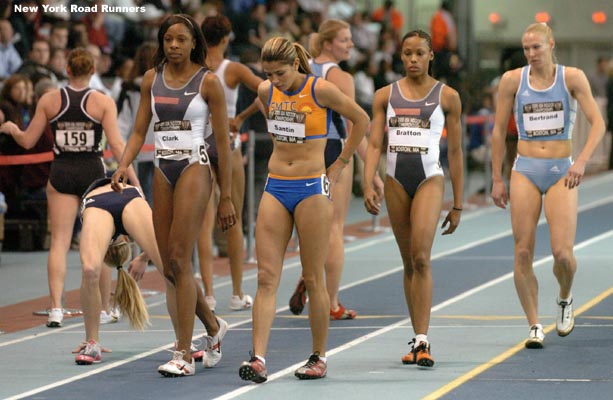 Runners get ready for the second 800m prelim. Katie Doswell does a backbend!