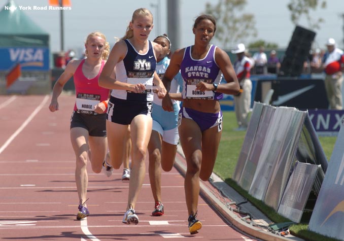 Kansas State's Morgan Bonds and BYU's Heidi Magill led on the first lap in the third heat of the junior 800.