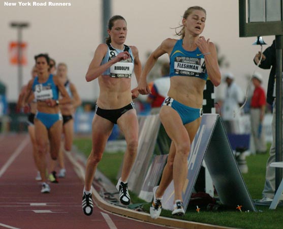 With one lap to go, Flanagan was still out front, Fleshman continued to run in second, and Rudolph was in third.