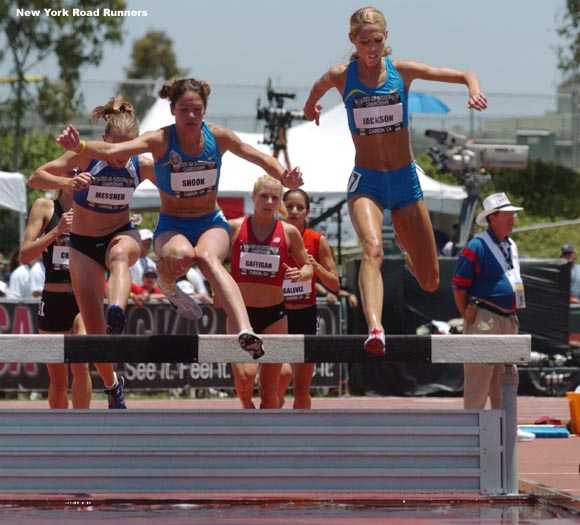 With approximately 950 meters remaining, Elizabeth Jackson drew even with Shook at the water barrier and then moved ahead of her.