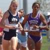 Kansas State's Morgan Bonds and BYU's Heidi Magill led on the first lap in the third heat of the junior 800.