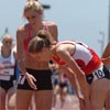 Bowman congratulates Bedell. Both are recent high school graduates. Bowman will run for Tennessee next year, and Bedell will run for Baylor. Lauren Centrowitz (right) finished third in 4:25.11.