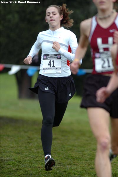 ...among the top six in the final half mile, but the runners who made up the top six didn't change. Above: Jenny Barringer finished third in 22:05.1.