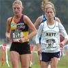 Hansons-Brooks' Melissa White (left) runs with the Navy's Kimberly Fagen.