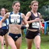 Dana Coons (left) and Melissa Cook run together.