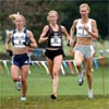 At the 3K mark, (L-R) Jen Rhines, Blake Russell, and Colleen De Reuck continue to run together.