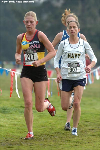 Hansons-Brooks' Melissa White (left) runs with the Navy's Kimberly Fagen.