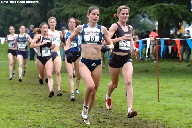 Dana Coons (left) and Melissa Cook run together.