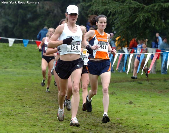 Colleen Stroud of Denver, Colorado, leads an unidentified runner.