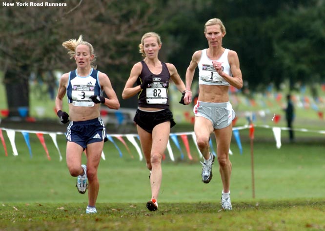 At the 3K mark, (L-R) Jen Rhines, Blake Russell, and Colleen De Reuck continue to run together.