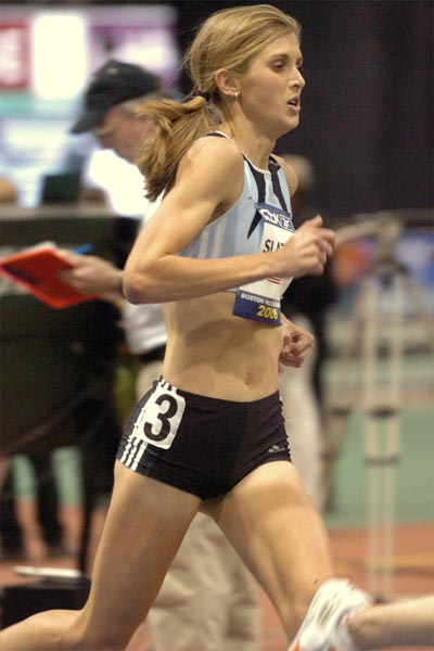 Former University of Colorado runner Sara Slattery runs behind the second rabbit.