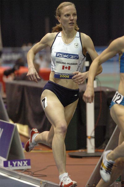 Carmen Douma-Hussar is coached by Marcus O'Sullivan, an experienced indoor miler.