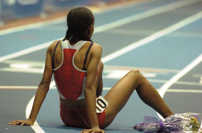 After crossing the finish line in 8:30.94 - the third fastest indoor 3K ever run by a woman - Meseret Defar sat down on the track and watched everyone else finish.