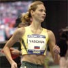 Iryna Vaschuk, a former middle distance star for USC and a native of Russia, sets the pace for the group of four Americans.