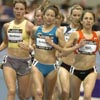 Sara Hall, Sarah Schwald, and Amy Mortimer run at the front of the pack.